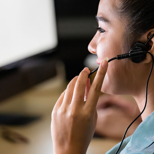 woman answering call - Canva